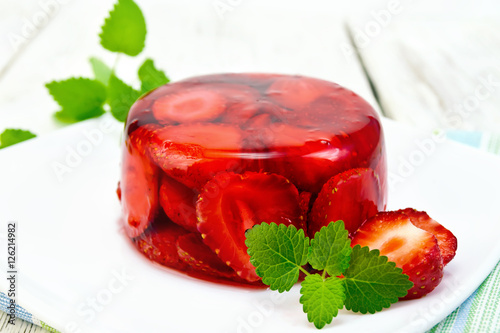 Jelly strawberry with mint on table