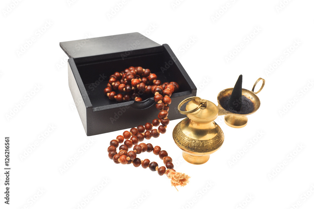 Buddhist or hindu accessories - prayer beads (Japa Mala), incense burner  and vintage brass vessel for aroma oil isolated on white background Photos