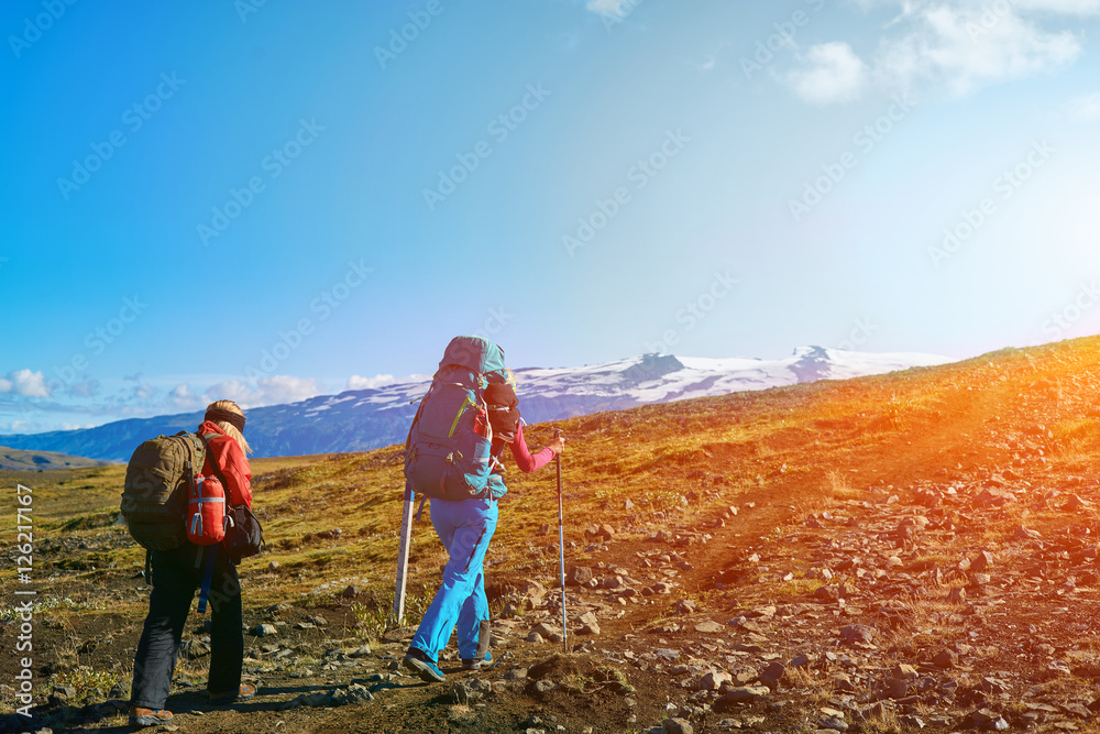 woman hikers on the trail, hiking in Iceland