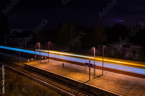 Train starting it's trip from a station platform