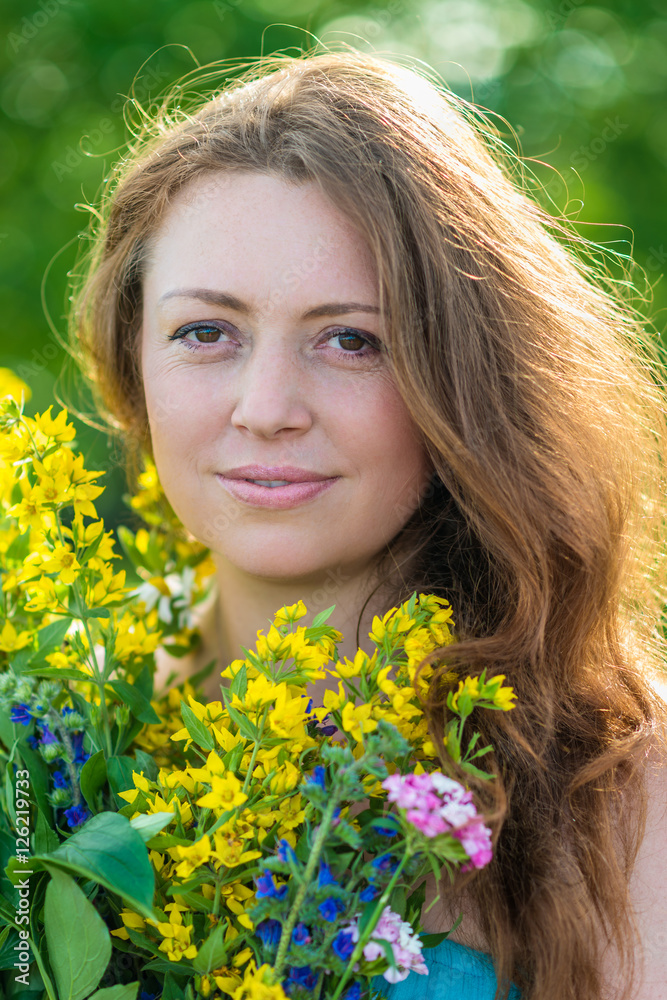 Portrait of a beautiful girl with flowers Portrait of a beautiful girl with flowers