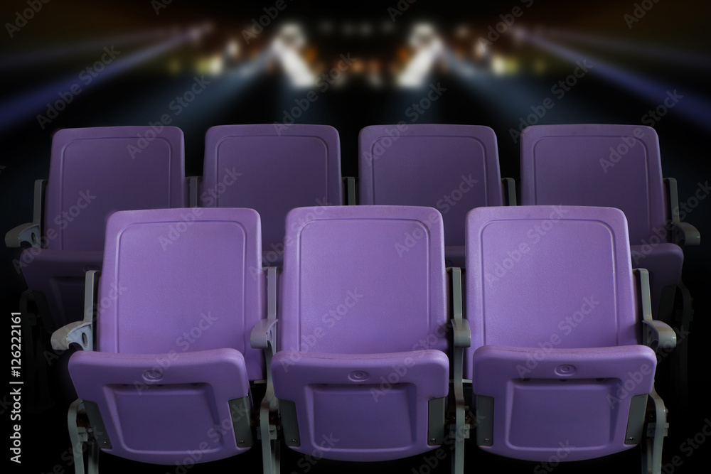 Obraz premium Empty theater auditorium or cinema with purple seats