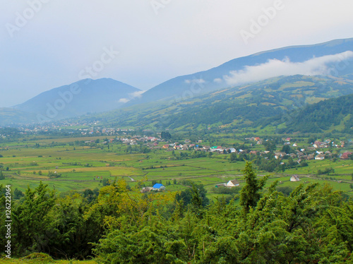 View on the village in Carpathians, Ukraine © olyasolodenko