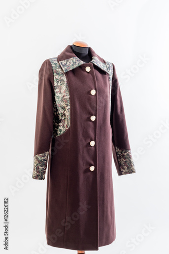 Burgundy coat for women with colorful details on white background