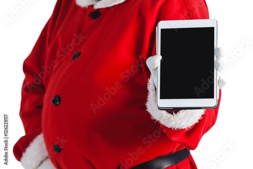 Mid-section of santa claus showing digital tablet