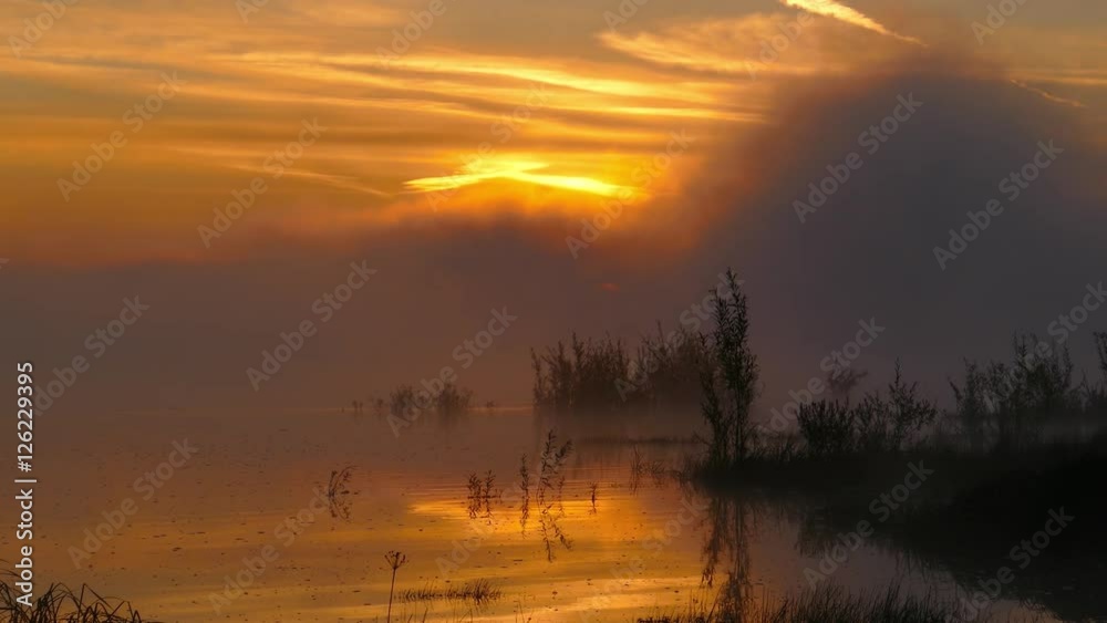 Landscape with sunrise on river in fog, 4k
Landscape with sunrise on river in fog, 4k