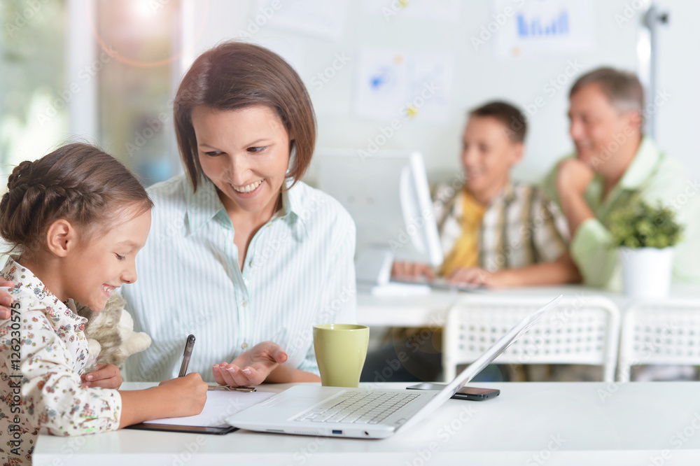 Mother with daughter do homework Mother with daughter do homework