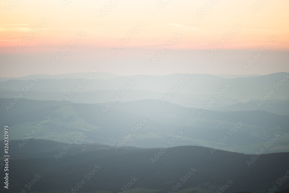 Obraz premium A beautiful perspective view above mountains with a gradient