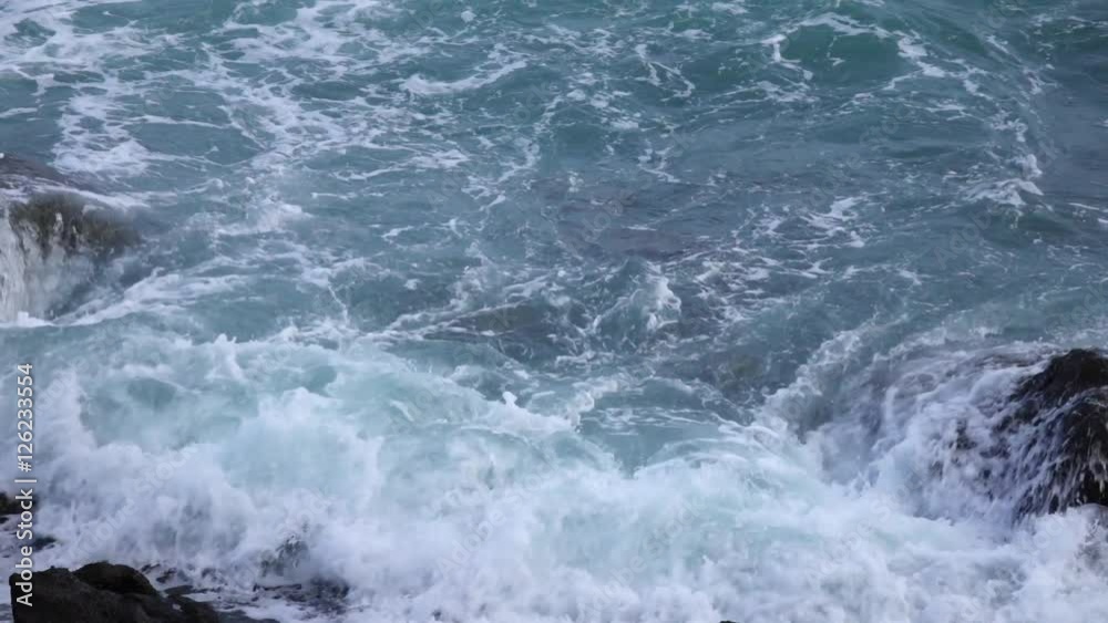 Amazing sea swash between boulders. Relax view of water stream, foam, splash and textured rocks. Beautiful background for amazing intro in excellent full HD clip. Dramatic view of expressive nature. Amazing sea swash between boulders. Relax view of water stream, foam, splash and textured rocks. Beautiful background for amazing intro in excellent full HD clip. Dramatic view of expressive nature.