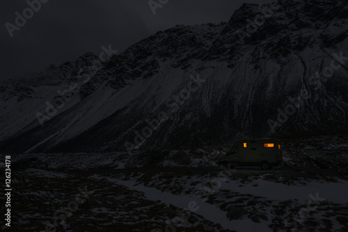 mobile home in winter weather in the moutains by night © Michael Schroeder