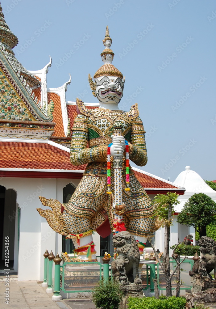 Wat Arun, Bangkok, Thailand. Dharmapala - Guardian of the Dharma and Buddhist Doctrine - a deity protecting the Buddhist teachings, as well as those who practice the Dharma