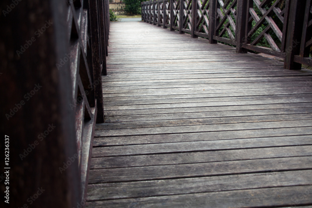 Obraz premium wooden bridge . Boardwalk over the river 