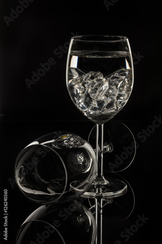 Wineglasses On A Black Glass Studio Background