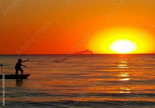 Fototapeta Naklejka Na Ścianę i Meble -  Fisherman fishing at lake in Morning, Turkey