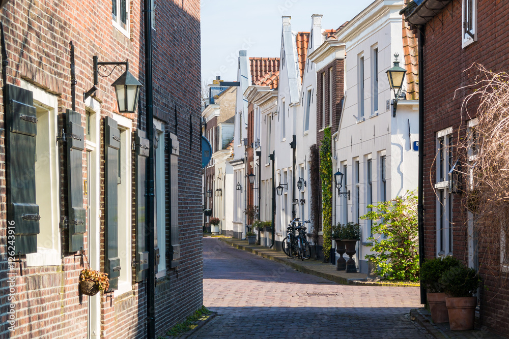 Narrow street in old town of Naarden, Netherlands