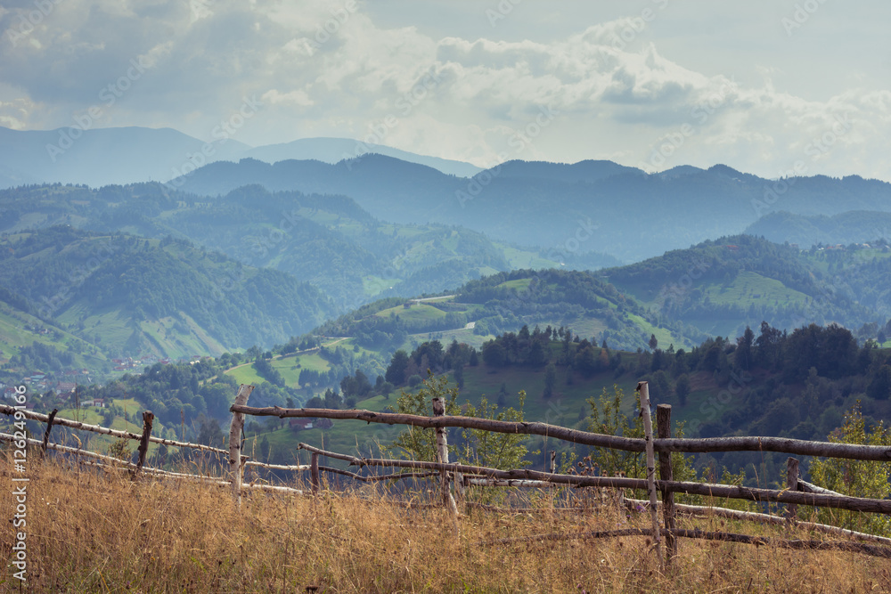 Picturesque mountain landscape in Romania. Rural Romanian landscape of Magura Village, near Brasov city. 