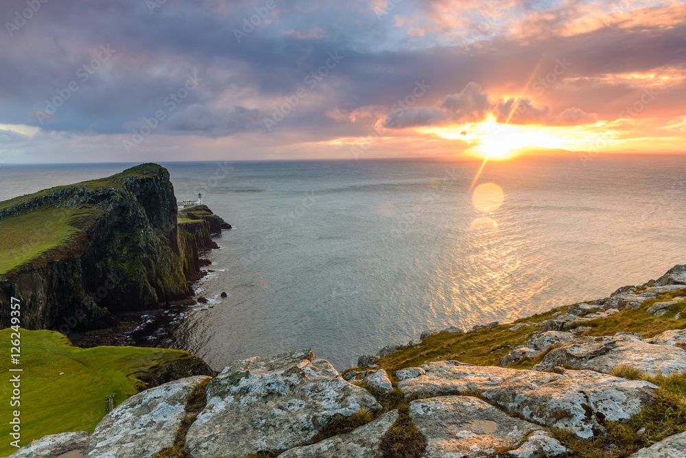 Neist point lighthouse, Isle of Skye, Scotland - beautiful landscape image of the iconic building at sunset