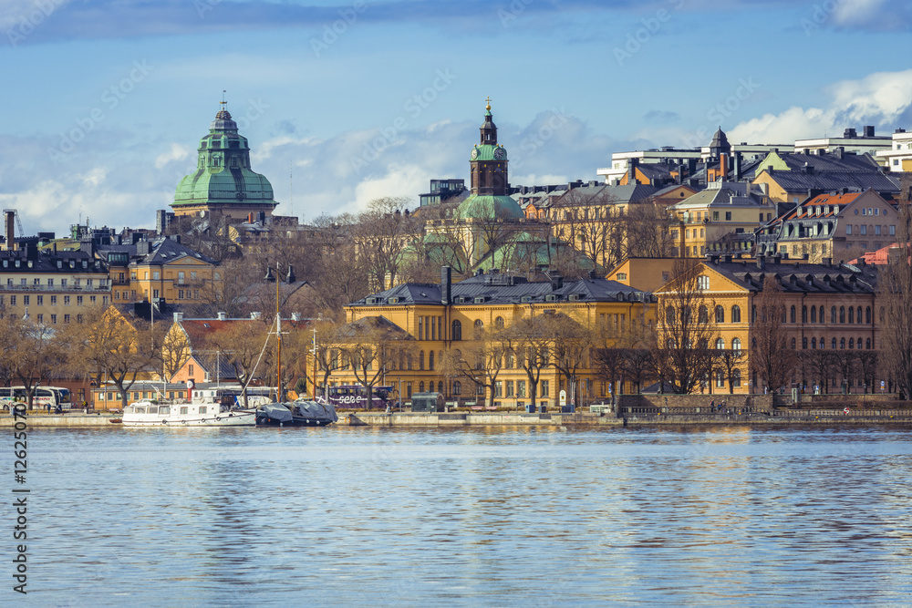 Historic old buildings in the Stockholm bay in Sweden