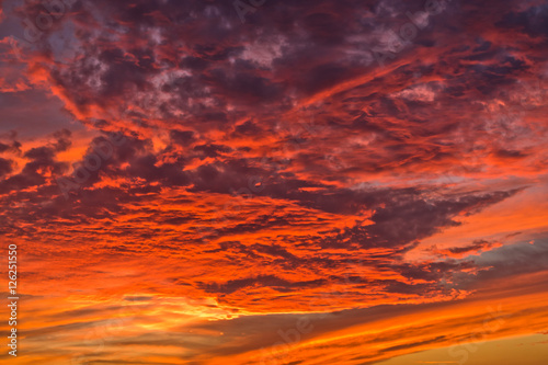 Dramatic red cloudscape at sunset like a fire in the sky