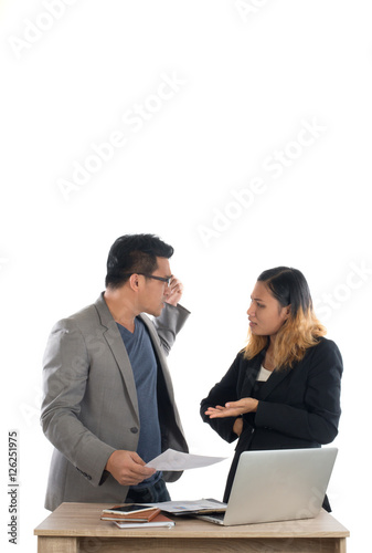 Young business woman standing with her boss conversation about t
