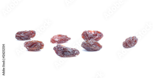 Dried grapes on white background.