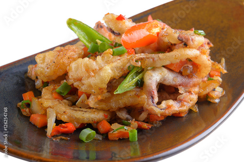 Fried squid with chilli thai food on white background
