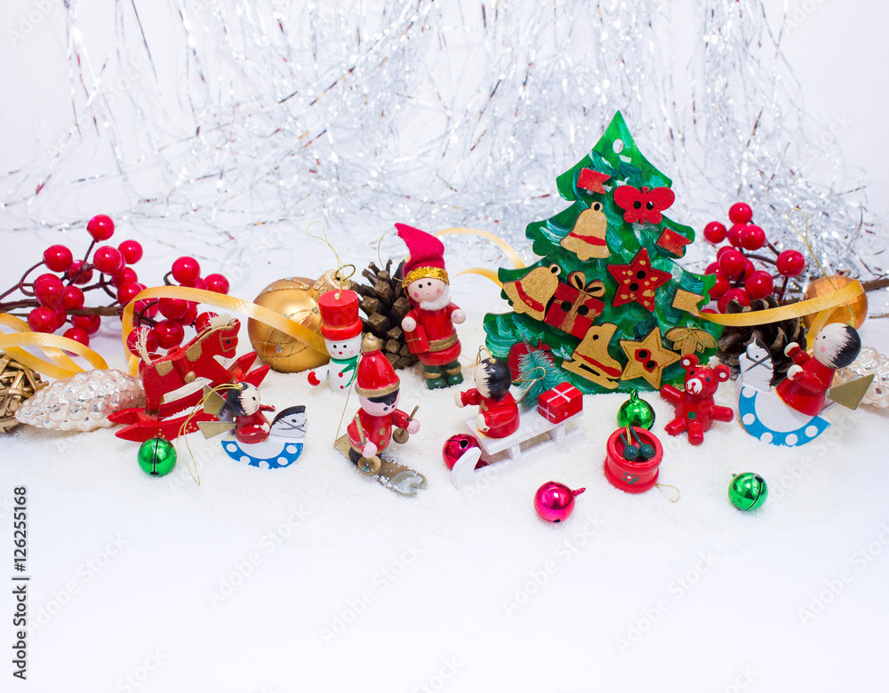 Christmas or New Year background: fur-tree, branches, gifts, colored glass balls, decoration and cones on white background Christmas or New Year background: fur-tree, branches, gifts, colored glass balls, decoration and cones on white background