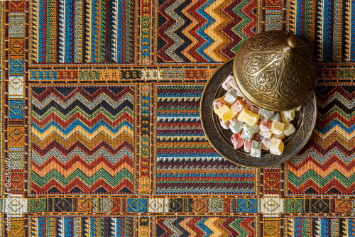 sweets on the traditional Arabian carpet © river34