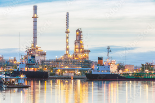Oil refinery plant at twilight with copy space.
