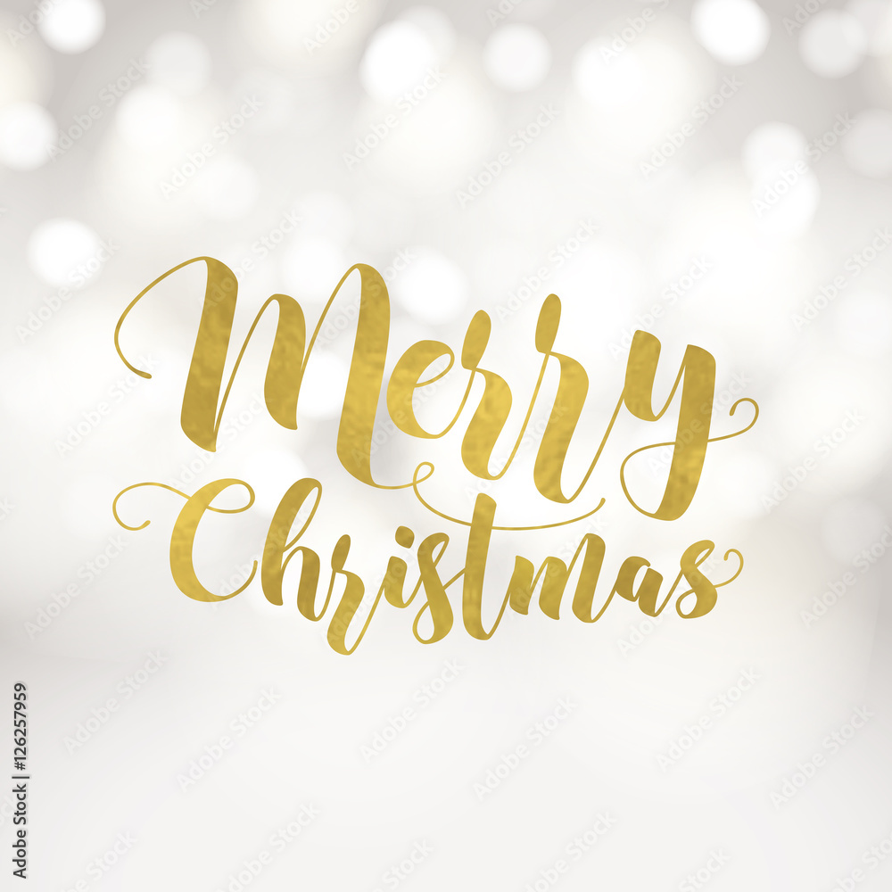 Merry Christmas greeting card. Typographic vector design, gold foil effect, beautiful light bokeh background, festive lights.