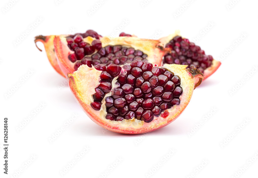 Ripe pomegranate fruit isolated on white background cutout Ripe pomegranate fruit isolated on white background cutout