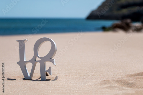 Love words on sand
