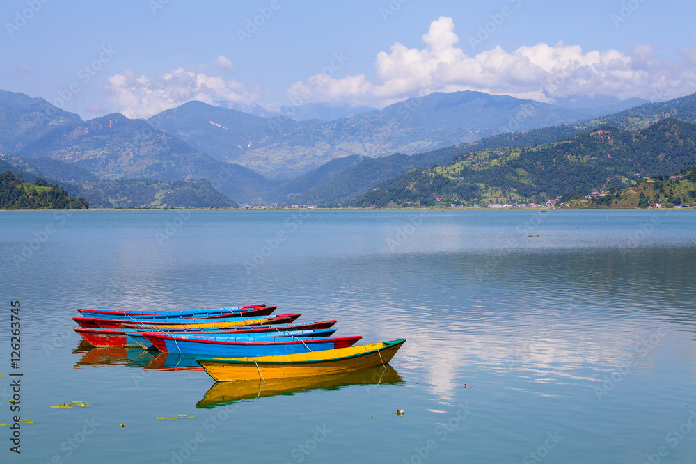 Lake Phewa in Pokhara, Nepal, with the Himalayan mountains Lake Phewa in Pokhara, Nepal, with the Himalayan mountains