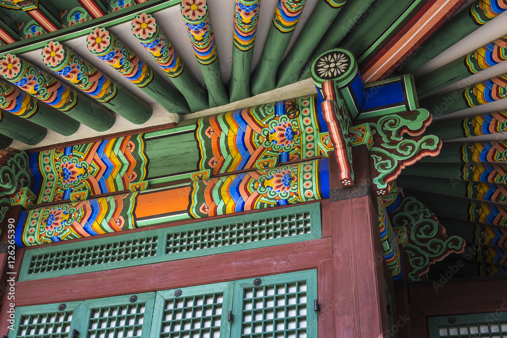 Fototapeta premium Detail of Traditional Korean Roof, Colourful Decorated Ornament