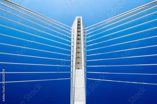 Fototapeta Naklejka Na Ścianę i Meble -  Wonderful white Millennium bridge structure over clear blue sky in Podgorica, Montenegro