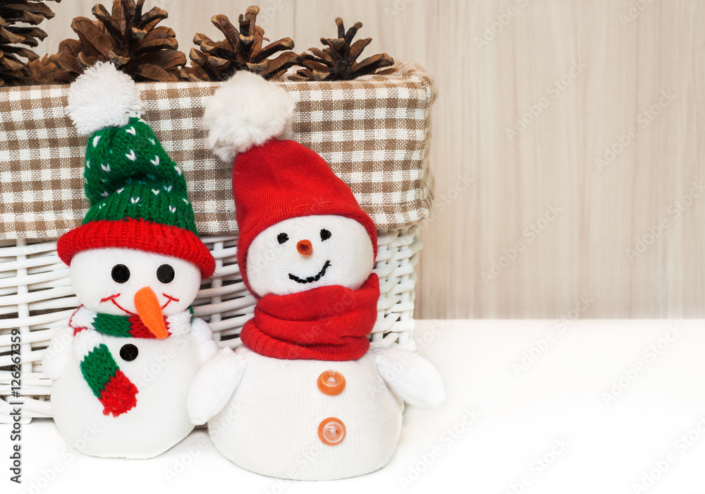 Christmas decoration with smiling snowman toy. Christmas decoration with smiling snowman toy.