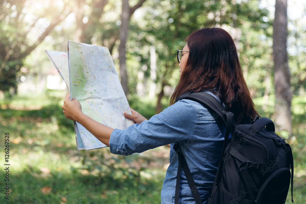 Naklejka premium The tourist Cute girl at the forest