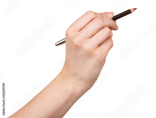 Black pencil makeup in female hand isolated on white background.