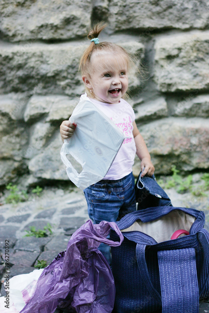 The little girl throwing things Stock Photo Adobe Stock