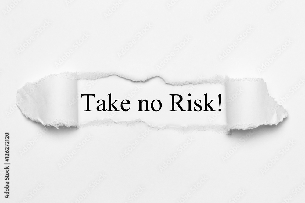 Fototapeta premium Take no Risk on white torn paper