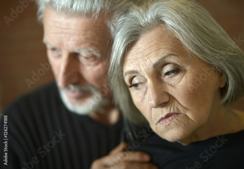 Thoughtful senior couple