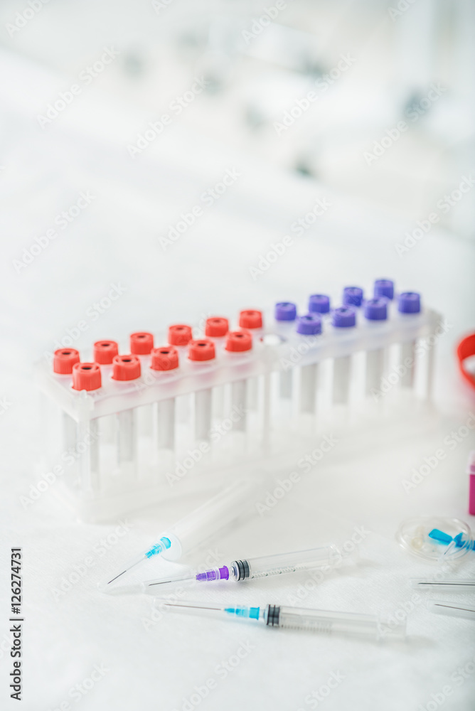 Sterile test-tubes and needles for testing