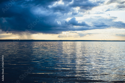 lake landscape with cloud reflections © Elena Kharichkina