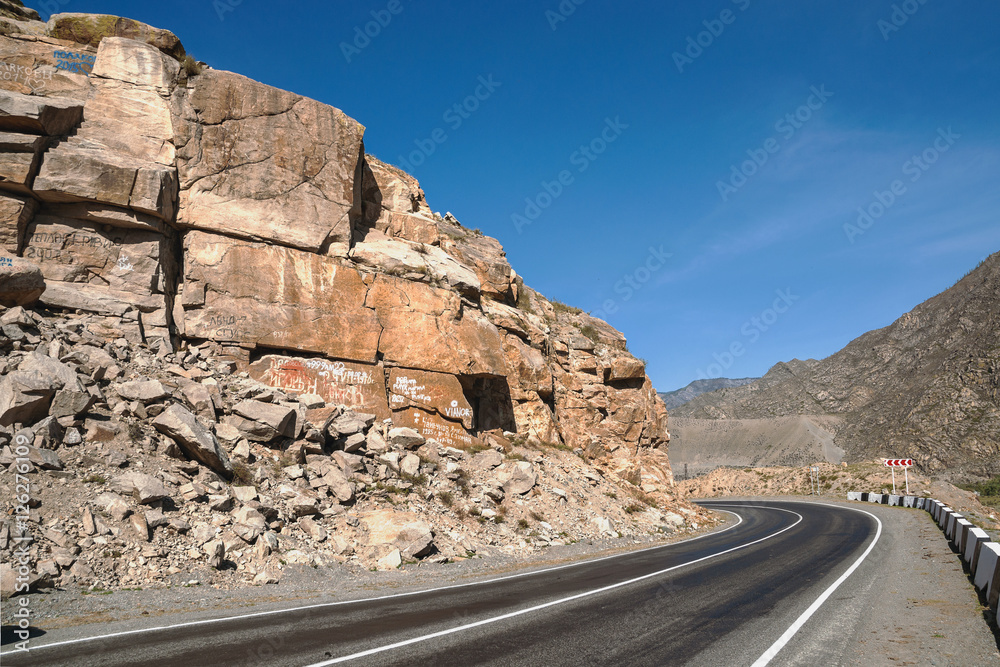 Mountain road/Mountain road turn, Altai Mountains, Siberia, Russia Mountain road/Mountain road turn, Altai Mountains, Siberia, Russia