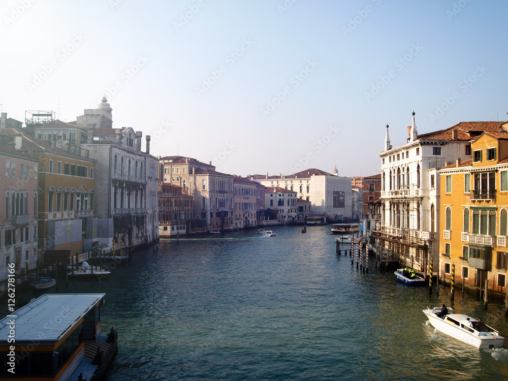 Canal in Venice populated by boats