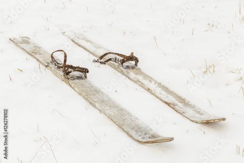 Pair of old skis on the snow