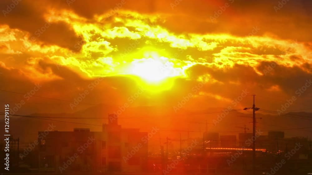 Daegu, Korea, Beautiful sunset with large clouds behind shining sun Daegu, Korea, Beautiful sunset with large clouds behind shining sun
