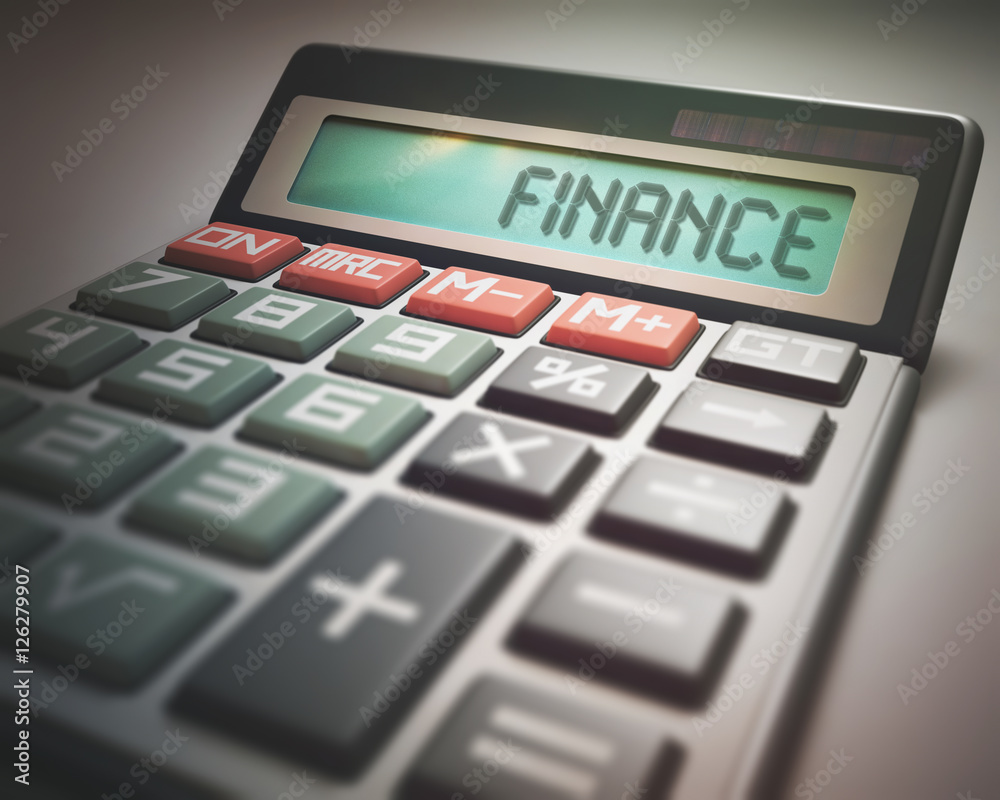 Solar calculator with the word FINANCE on the display. Business and Finance concept. Solar calculator with the word FINANCE on the display. Business and Finance concept.