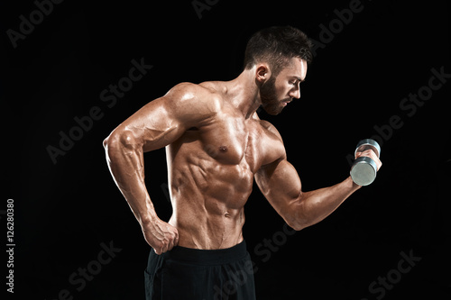 Muscular bodybuilder guy doing posing © nazarovsergey