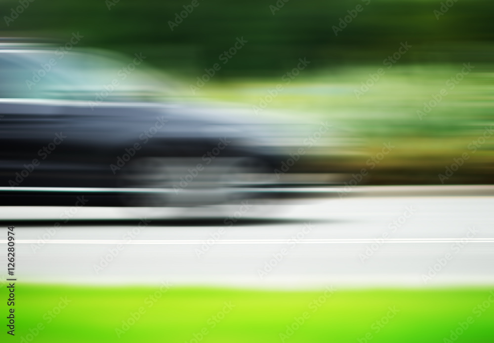 Horizontal car on road motion blur background